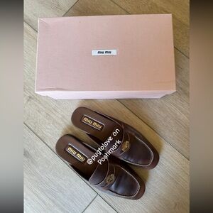 Miu miu penny loafer slides size 38 distressed leather